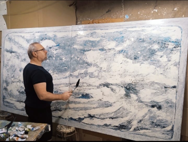 Anatoliy Halytskyi at work on a large-format canvas in his studio